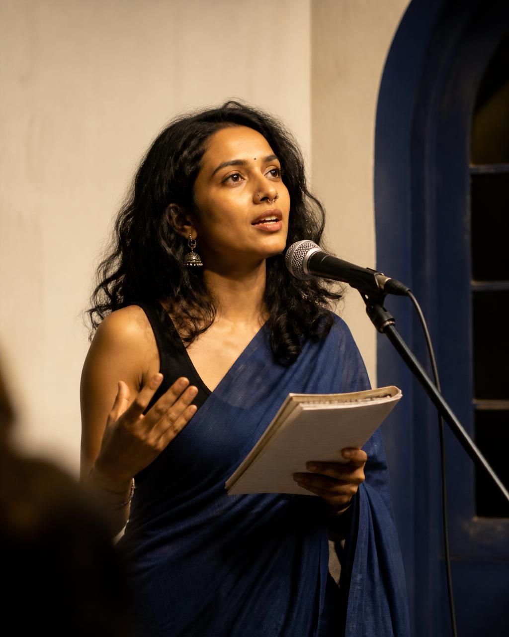 Poet performing under a spotlight